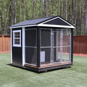 This 8x8 dog kennel is a stylish and practical outdoor home for your beloved pet. The kennel's black siding and white trim add a sleek and modern touch to your backyard, making it a standout feature. The kennel's sturdy wooden construction ensures its durability and provides a secure and comfortable home for your pet. Proper ventilation is installed to provide your furry friend with optimal air circulation, ensuring their comfort and well-being at all times. The kennel's compact size makes it perfect for smaller outdoor spaces, while still providing ample space for your pet to play, rest, and move around. Whether used for personal or commercial purposes, this kennel is a reliable and stylish solution for your pet's outdoor living needs. It will provide a secure and comfortable space for your furry friend while adding value to your backyard.